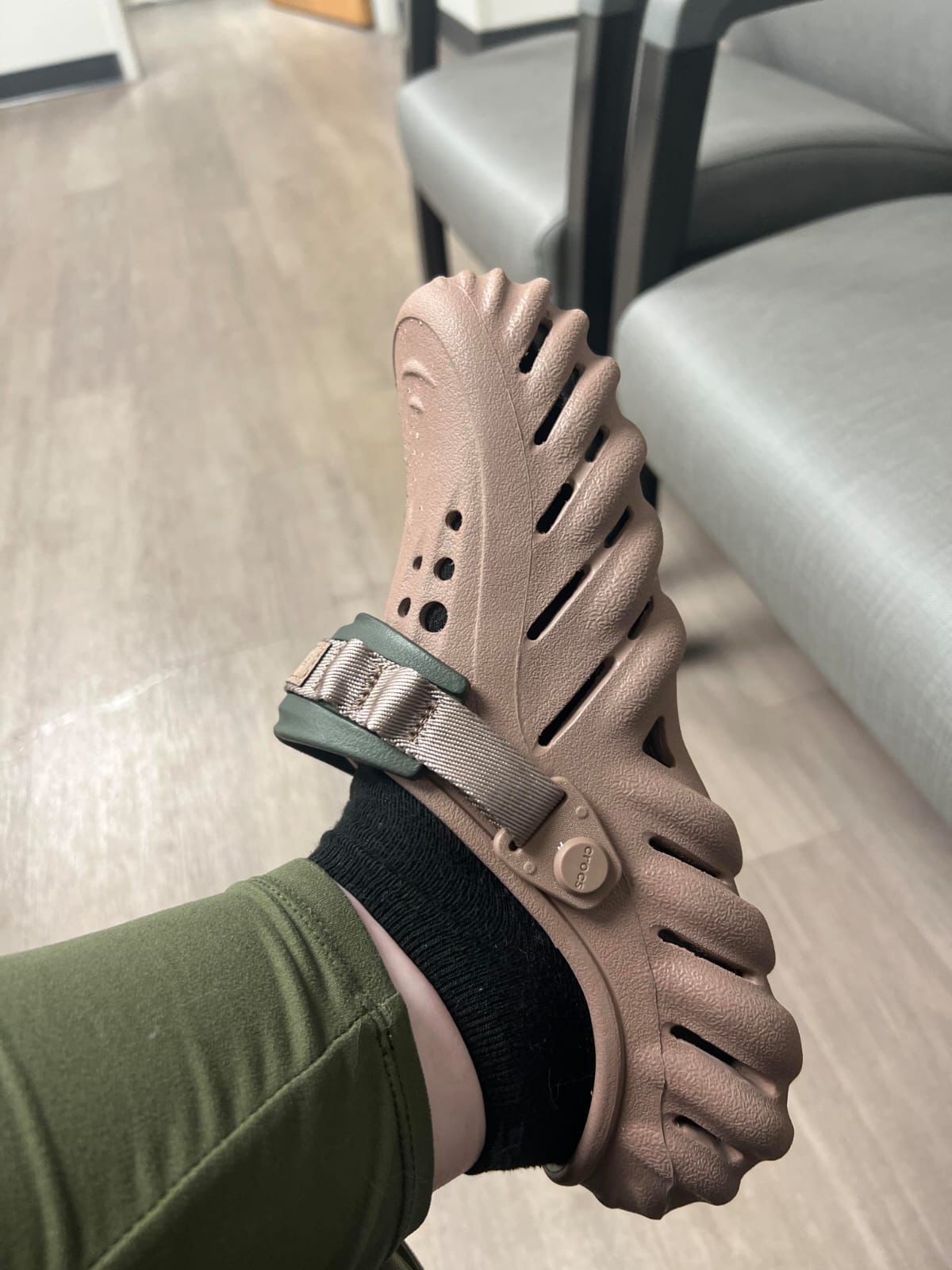 WhatsApp Image 2025-11-23 at 1.42.41 PM Side view of Crocs Echo Clogs with charms for adults in premium finish