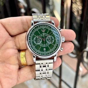 Side profile of men’s chronograph watch with green dial and stainless steel strap