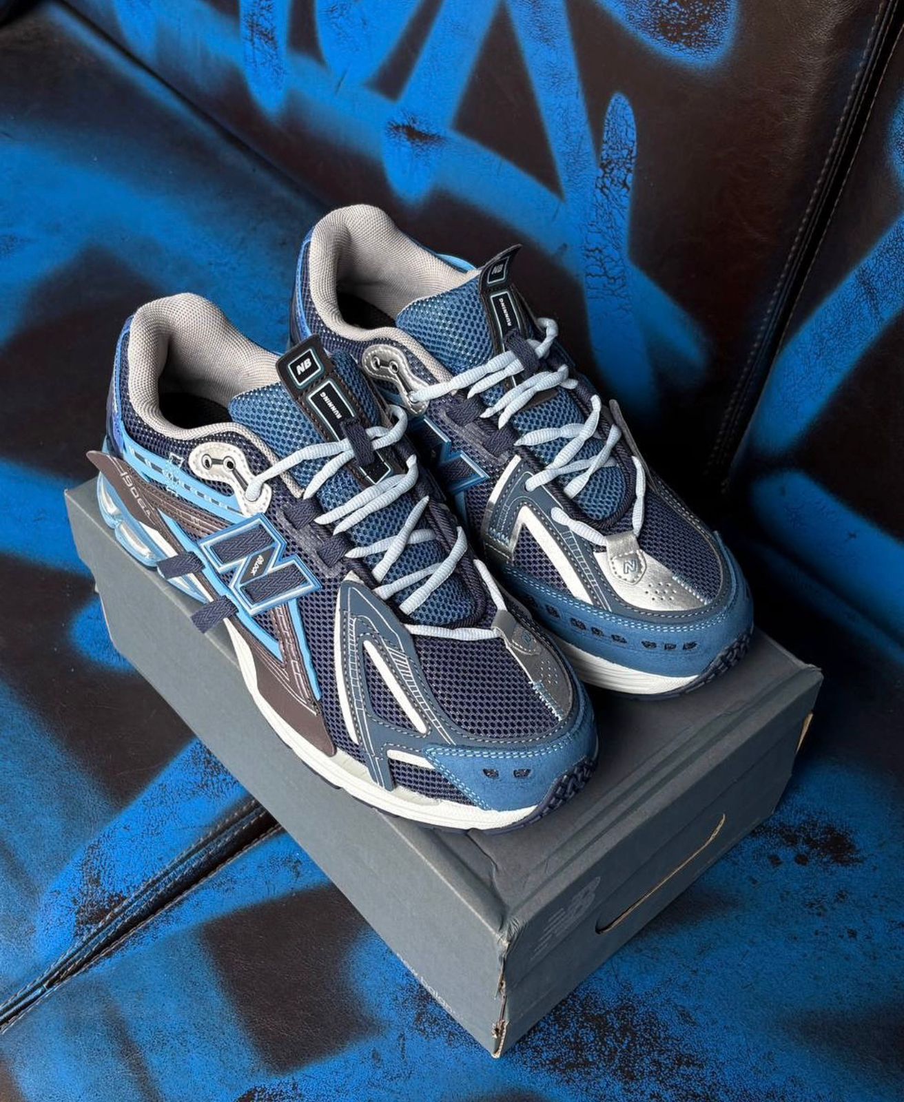 WhatsApp Image 2025-12-21 at 7.48.06 PM (1) Deep blue performance-style sneakers for men with cushioned sole and premium box packaging.